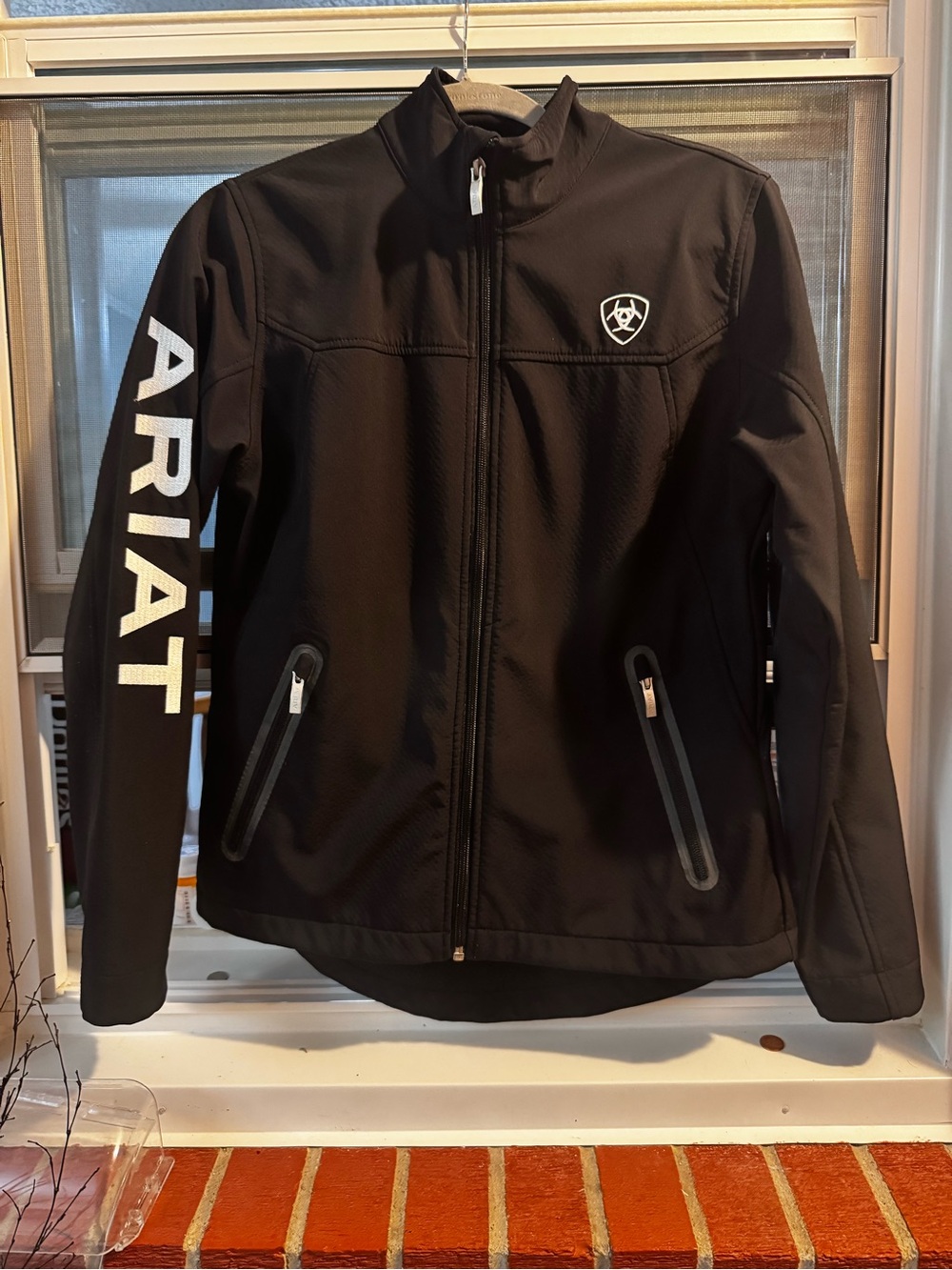 Ariat women’s Black Softshell Jacket with Sleeve Logo